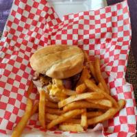 Big Nate's Special Sandwich · Choice of smoked chicken, brisket or pork piled high on a toasted bun. Smothered with choice...