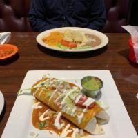 2 Enchiladas Blancas · Enchiladas stuffed with your choice of chicken, chorizo, ground beef or barbacoa. Topped wit...