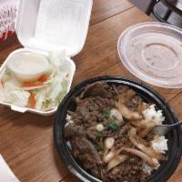 Korean Beef Bulgogi Plate · Served with rice and salad.