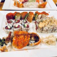 Sushi & Sashimi Combo · 3 piece tuna, 3 piece yellowtail, 3 piece salmon sashimi, 5 piece sushi and 6 piece Californ...