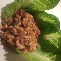 Chicken Lettuce Wraps · Romaine lettuce, crispy shallots and basil.
