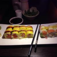 Gold Medal Roll · King crab, crunch and avocado inside and salmon on top with mango salsa and honey wasabi sau...