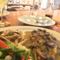 Chicken Marsala · Sauteed chicken breast, fresh mushrooms, Marsala wine sauce, sauteed vegetables and pasta.