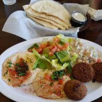 Veggie Plate · Green salad, hummus, falafel and potato salad or baba ganoush. Served with pita bread and ta...