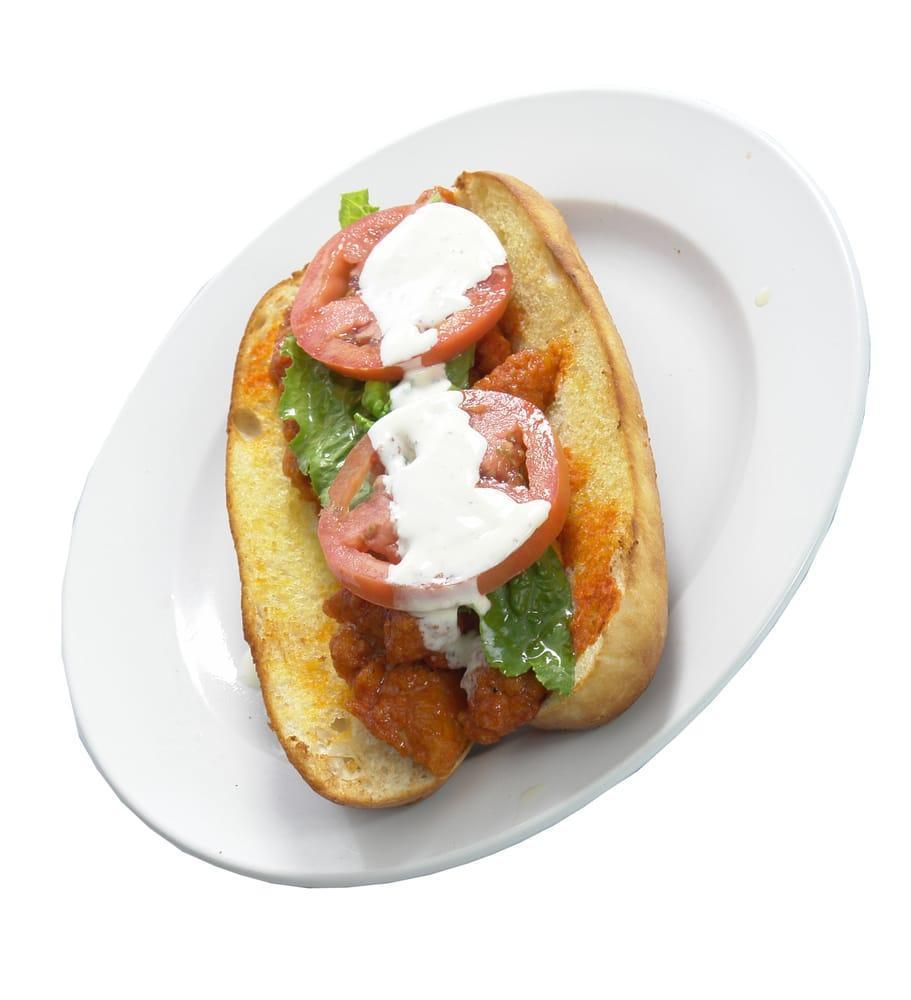 Buffalo Chicken with Ranch Sub Sandwich · Buffalo chicken, lettuce, tomatoes and ranch dressing Cajun.