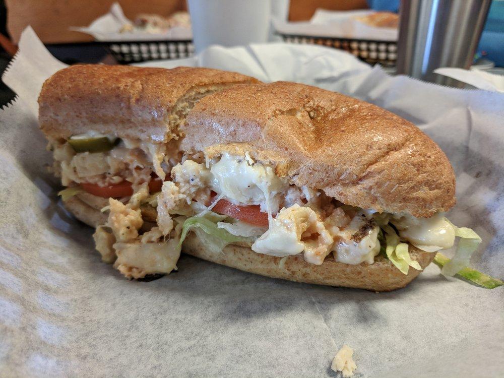 Buffalo Chicken Sub · Marinated chicken, Buffalo sauce, pepper jack, lettuce, tomatoes and your choice of blue cheese or ranch dressing.