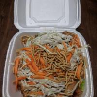 Sesame Thai Rice Bowl · Romaine lettuce, cabbage topped with rice, cilantro, grilled chicken breast, shredded carrot...