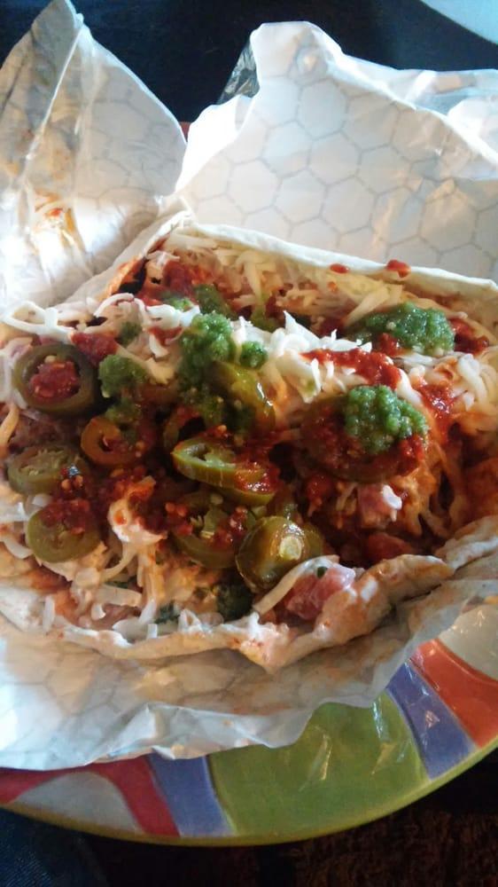 Burrito Ranchero · Meat, rice, beans, avocado, pico de gallo, sour cream & cheese.