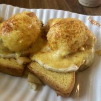 Avocado Benedict · Smashed avocado, sliced tomatoes, mozzarella cheese on an English muffin, topped with fresh ...