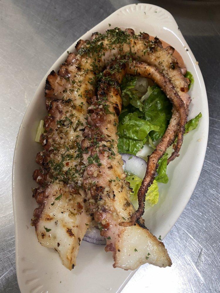Grilled Octopus · Topped with olive oil and vinegar.