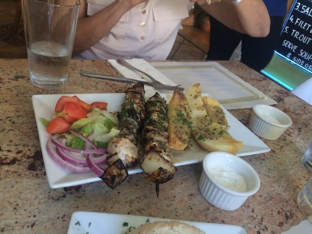 Chicken Souvlaki Platter · 2 skewers of grilled chicken and onions. Served with choice of sides.