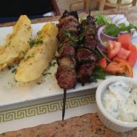 Lamb Souvlaki Platter · 2 skewers of grilled lamb and onions. Served with choice of sides.