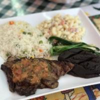 Churrascos · Grilled thin steak topped with chirmol sauce (tomatoes, onions, cilantro, garlic and lime ju...