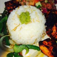 Chicken Kabob · A full skewer of chicken breast cubes with grilled mixed vegetables. Served with rice and Eg...