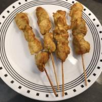 Chicken Satay · Marinated chicken in mixed of Thai spices on skewer served with cucumber sauce, peanut sauce...