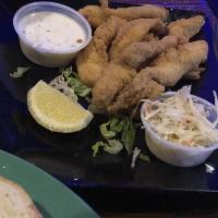 Fried Catfish Strips · Served with carrots, celery and tartar sauce.