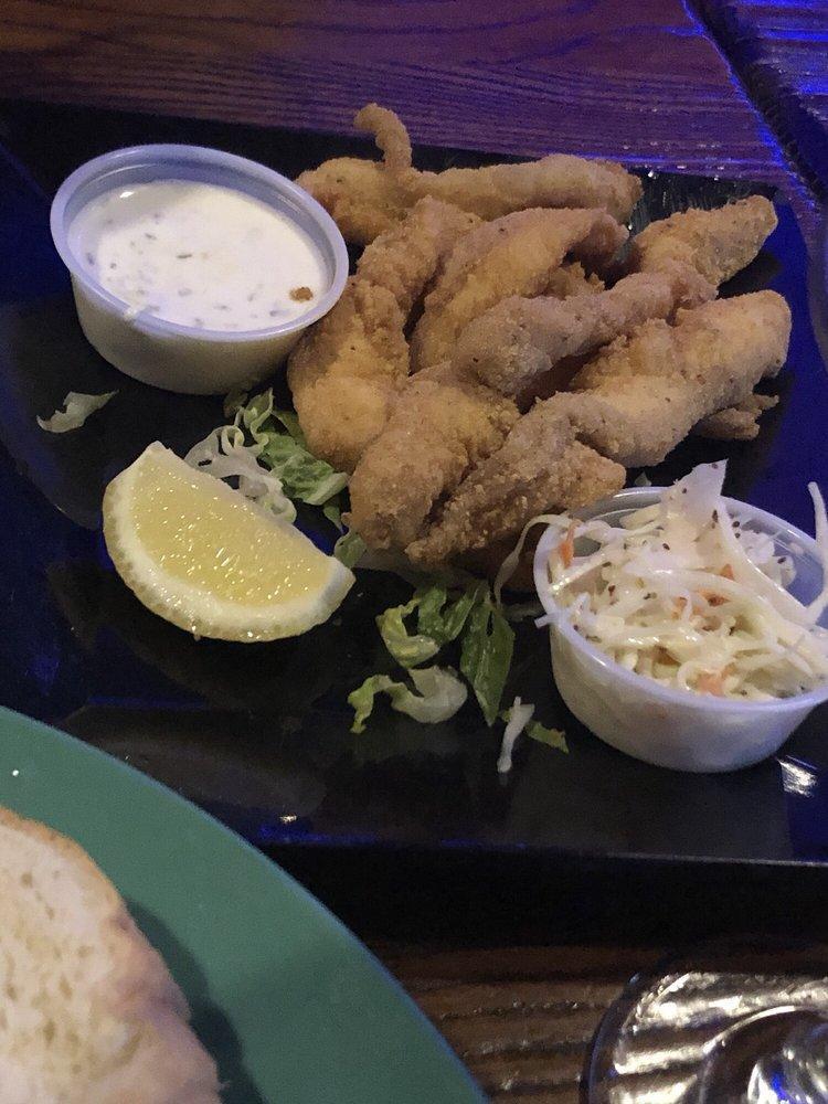 Fried Catfish Strips · Served with carrots, celery and tartar sauce.