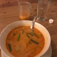 Tom Kha · Coconut milk soup with mushroom, onion, Kaffir lime leaves, galangal root, and lemongrass.
