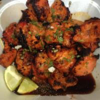 8 Pieces Chicken Tikka Boti · Tender pieces of boneless chicken breast marinated in spices and herbs and yogurt made in ta...