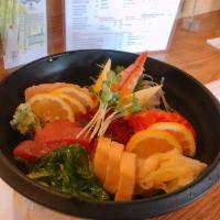 Chirashi · Sushi bowl. Chef's selection of fresh sashimi, served over rice & Japanese pickles served wi...