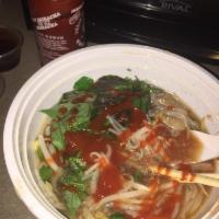 Pho Tai · Rice noodle soup with rare lean beef.