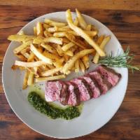 Steak Frites · Seared sirloin steak served with chimichurri and a side of smoked fries.