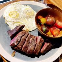 Steak and Eggs · 8 oz. top sirloin steak with 2 eggs and a side of heirloom tomato salad.