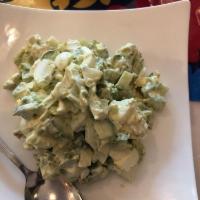 Avocado Salad · Avocado, pickled cucumber, boiled eggs and mayonnaise.