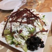 Greek Salad · Fresh vegetables with feta cheese, black olives and basturma.