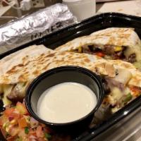 Friscodilla · Served With Your Choice of Meat, Cheese, Corn, Caramelized Onions and
Peppers, Served With P...