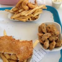 Halibut & Chips · Hand cut filet of wild caught halibut straight from the Bering Sea, battered in Spud origina...
