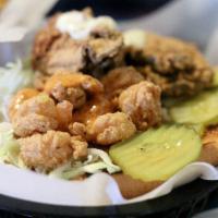 Fried Shrimp Po Boy · Served with homemade remoulade sauce. Shredded cabbage, tomato, pickles, mayo, Creole mustar...
