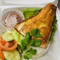 Fried Salmon with Rice · Salmon chien. Fried salmon filet, cucumber, tomato and lettuce, served with house special sw...