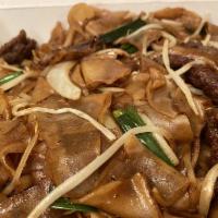 Beef Chow Fun · Wide rice noodles sauteed with beef, onion and bean sprouts.