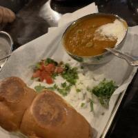 Pav Bhaji · Vegetable curry served with a soft roll.