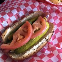 Chicago Dog · Yellow mustard, onion, neon relish, sport peppers, pickle spear, tomato, celery salt, and po...