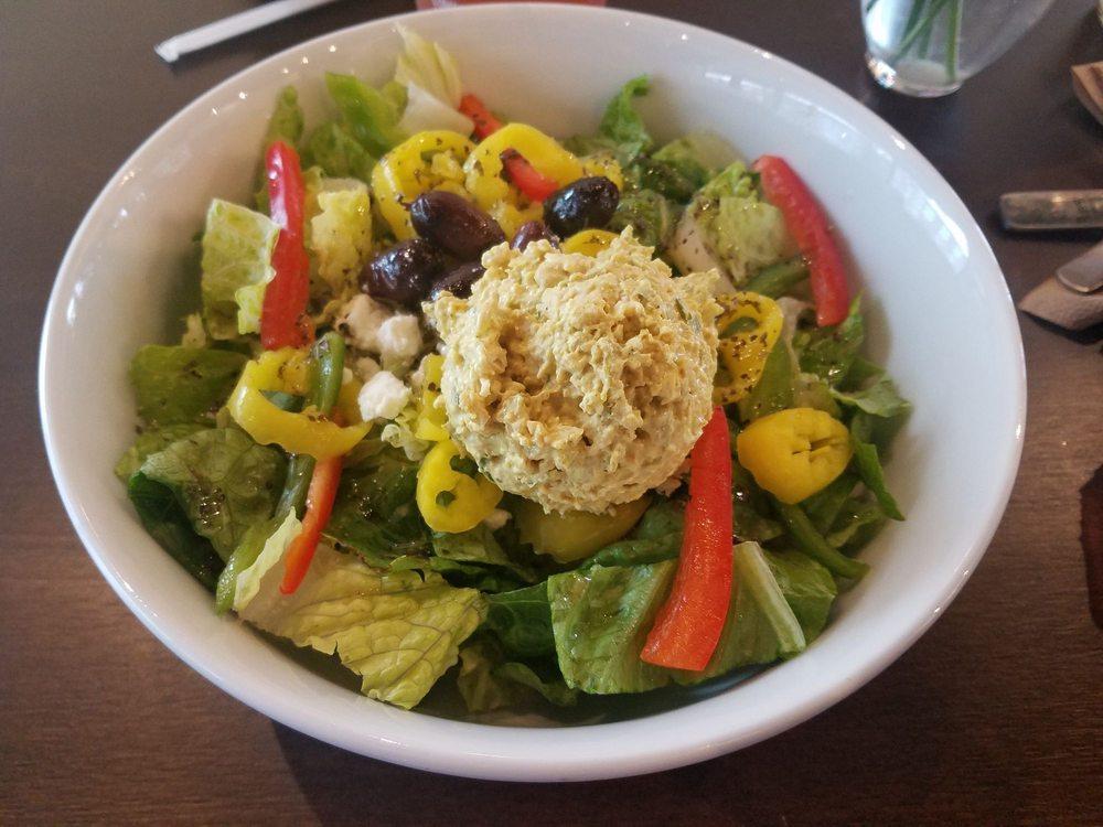 Zorba the Greek Salad · Romaine, cucumber, banana peppers, red tomato, red onion, Kalamata olives, feta cheese and Shayna's dressing.