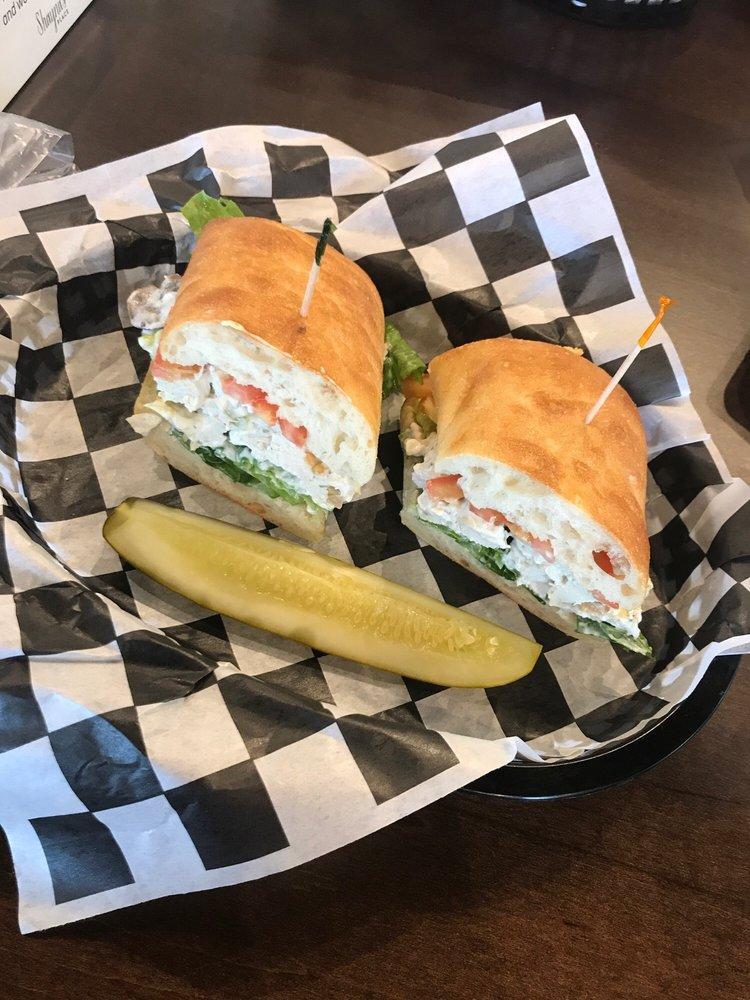 The Villager Sandwich · Tarragon chicken salad mixed with celery, tomato and romaine on ciabatta.