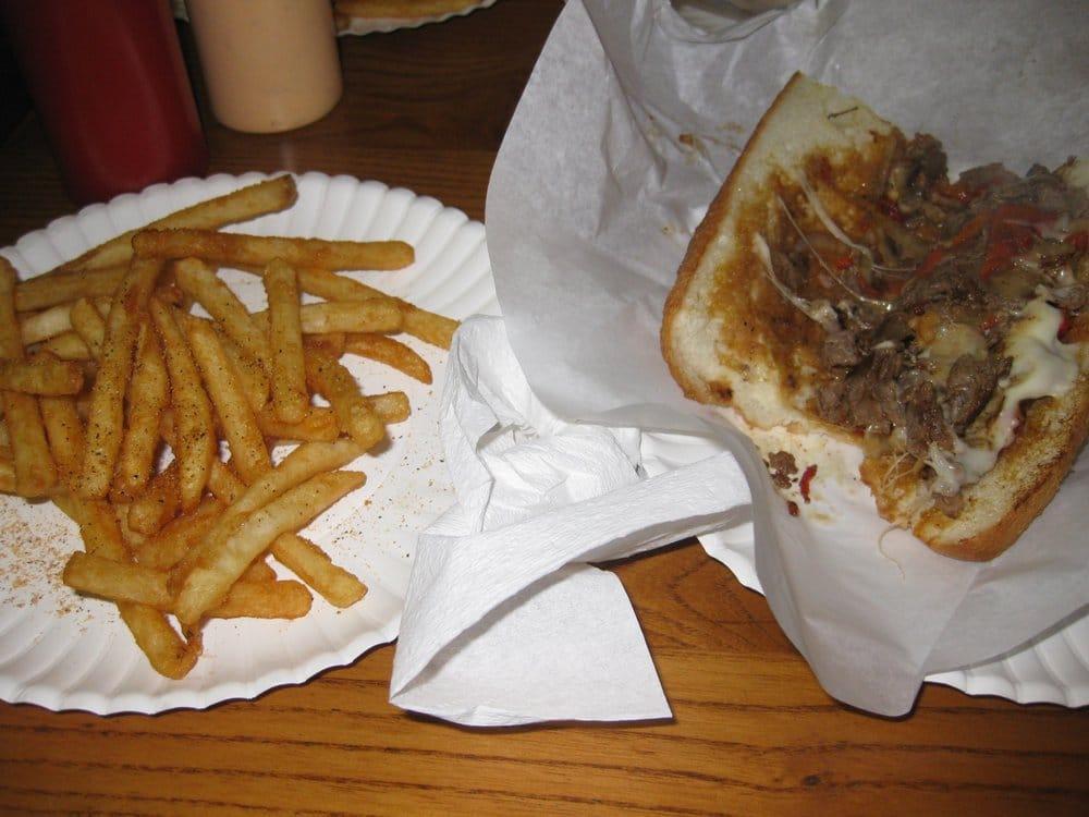Philly Cheese Steak Sandwich · Thinly sliced top choice beef or chicken with onions, your choice of provolone or white American cheese with mushrooms or roasted sweet peppers.