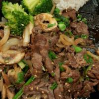 Bulgogi · Thinly sliced ribeye beef marinated with a homemade sauce, sautéed with mushrooms, scallions...