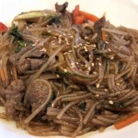 Japchae · Glass noodles, red pepper, carrots, onions, spinach, mushrooms and thinly sliced marinated b...
