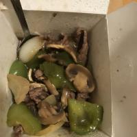 Beef Pepper Steak · Stir-fried beef with mushrooms, white and green onion, garlic, black peppers and gravy sauce...