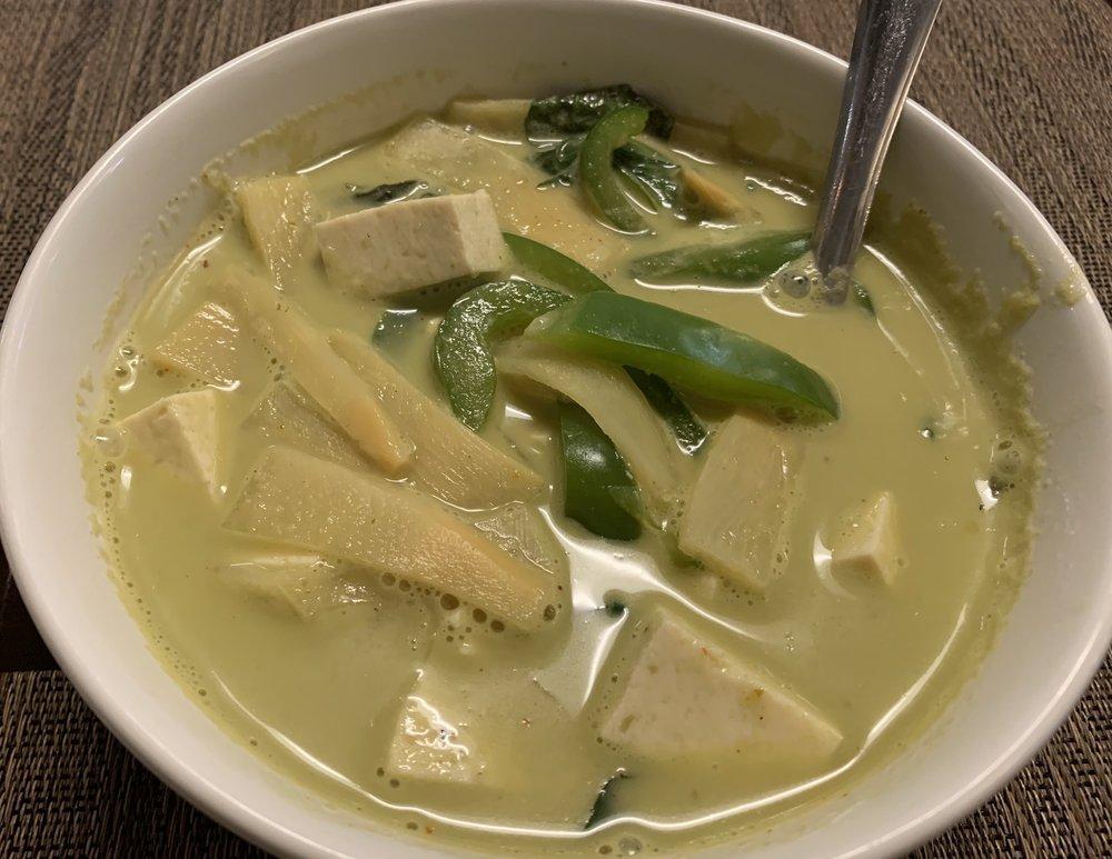 Green Curry · Keng khiao wan. A coconut curry made with fresh green chilies, bambo shoots and green beans. Flavored with Thai basil.