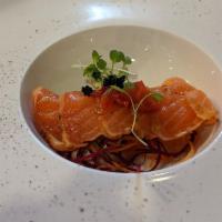 Cajun Salmon · Seared salmon, tobiko on top of daikon, carrot, served with spicy ponzu sauce.