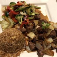 Shaking Beef · Wok-seared Angus beef. Comes with fried rice or white rice.