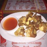 8 Cream Cheese Wontons · Chinese dumpling that comes with filling.