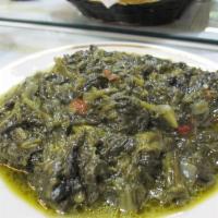 Sabzi · Stewed spinach cooked with onions, fresh herbs and spices.