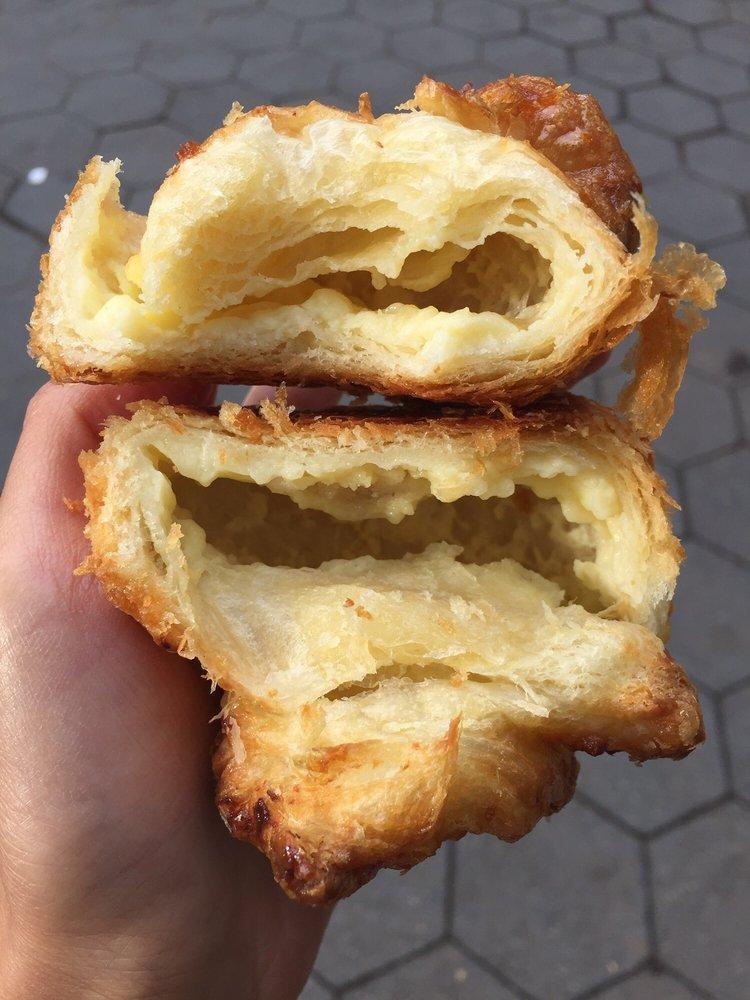Almond Croissant · A buttery, flaky, viennoiserie pastry of Austrian and French origin with a delicious almond filling. 