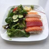 Chirashi Don Bowl · 1 tuna, 2 salmon, 1 albacore and 1 shrimp over rice, salad and miso soup.