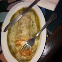 Enchiladas · Corn Tortilla. Enchilada filled with choice of meat or cheese, served with choice of red/ gr...